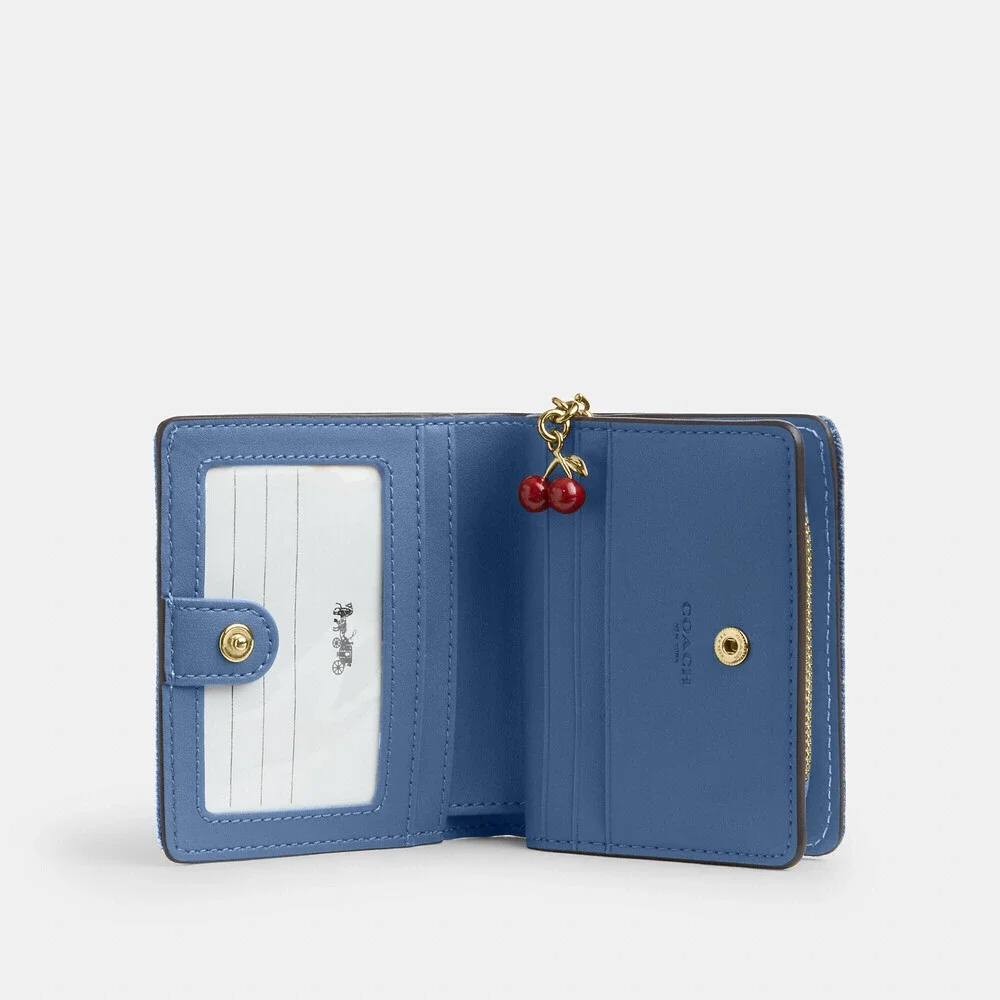 Coach Outlet Snap Wallet In Loved Denim With Charm